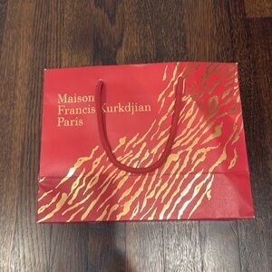 Madison Francis Kurkdjian shopping bag.